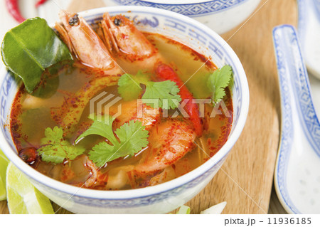 Tom Yum Goong - Thai hot and sour soup with prawns & mushrooms Tom Yum Goong - Thai hot and sour soup with prawns & mushrooms 11936185