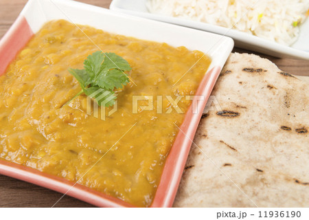 Tarka Dal - Indian yellow lentil curry with rice and chapatis Tarka Dal - Indian yellow lentil curry with rice and chapatis 11936190