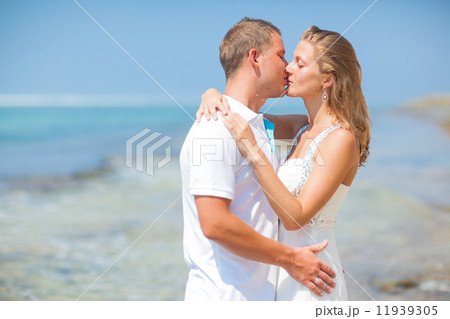 Couple on a Tropical Beach Couple on a Tropical Beach 11939305