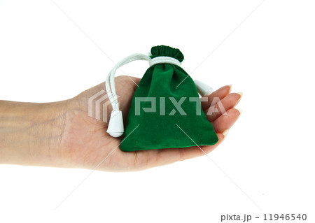 Green velvet pouch with hand isolated on white background 11946540