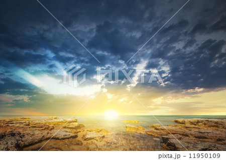 Sunset sky and tropical sea at dusk 11950109