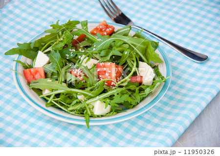 Greece salad with mozzarella, ruccola and tomatoes 11950326