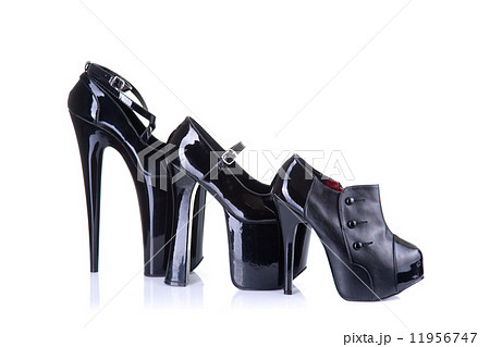 Row of different style female shoes 11956747