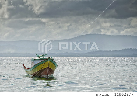A boat near indonesian fishermen village A boat near indonesian fishermen village 11962877