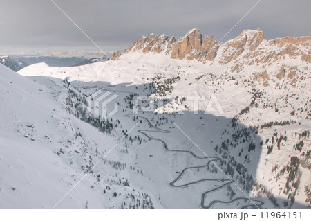 Dolomites aerial sky view taken from Helicopter in winter Dolomites aerial sky view taken from Helicopter in winter 11964151