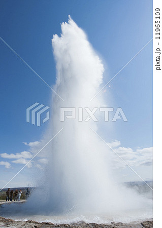 Geyser eruption in Iceland while blowing water Geyser eruption in Iceland while blowing water 11965109