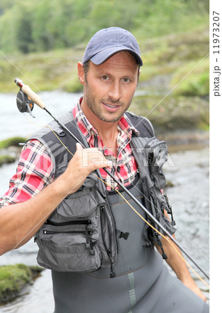 Fisherman with fishing line 11973207