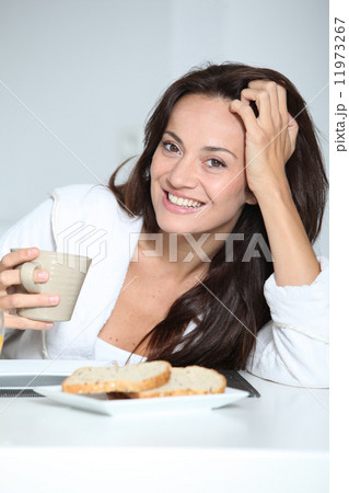 Closeup of woman having breakfast 11973267