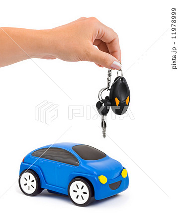 Hand with keys and car 11978999