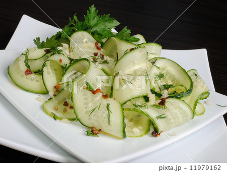 Salad from fresh cucumbers with garlic, dill, spices Salad from fresh cucumbers with garlic, dill, spices 11979162
