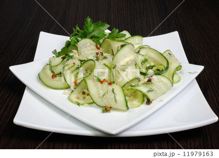 Salad from fresh cucumbers with garlic, dill, spices 11979163