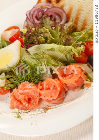 tasty appetizer with salmon 11986723