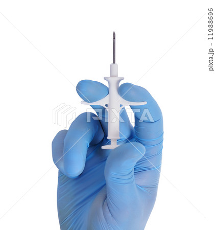 hand holding syringe hand holding syringe 11988696