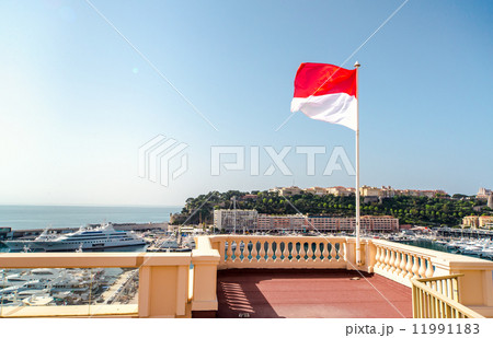 National flag of of the Principality of Monaco and view of port National flag of of the Principality of Monaco and view of port 11991183