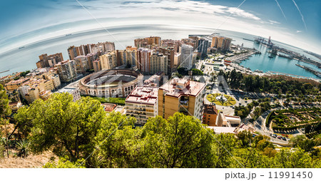 Panoramic view of Malaga bullring and harbor. Spain Panoramic view of Malaga bullring and harbor. Spain 11991450