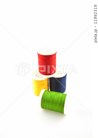 four multicolored spools four multicolored spools 11992319