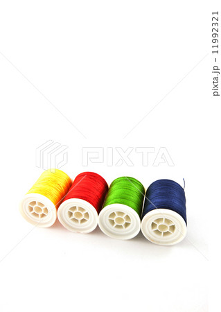 four multicolored spools four multicolored spools 11992321