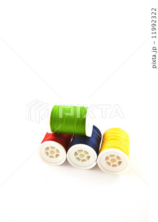 four multicolored spools four multicolored spools 11992322