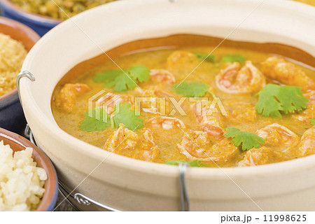 Moqueca de Camarao - Brazilian prawns in coconut milk and dende oil. Food from Bahia. 11998625