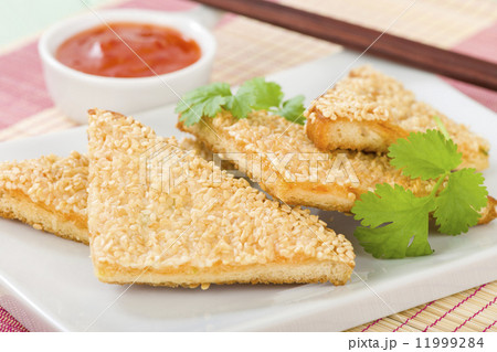 Hatosi (Prawn Toast) - Chinese toasted bread with minced shrimp and sesame seeds. 11999284