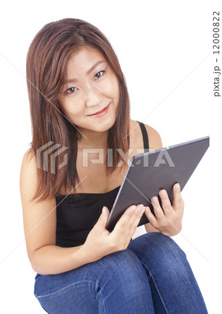 Young beautiful girl holding tablet 12000822