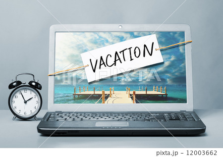 laptop with vacation note 12003662