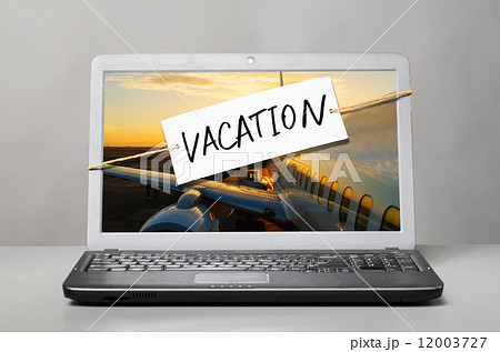 laptop with vacation note laptop with vacation note 12003727