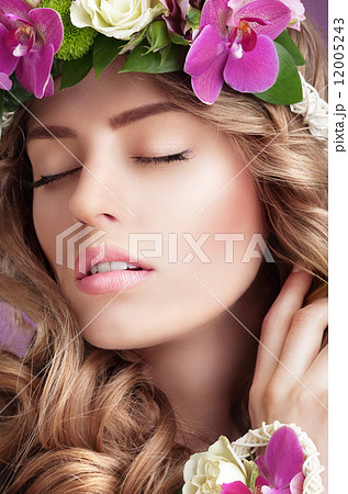 Pleasure. Face of Daydreaming Woman with Vernal Flowers 12005243