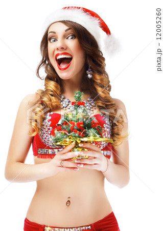 Happy New Year. Playful Gleeful Snow Maiden with Small Christmas Tree 12005260