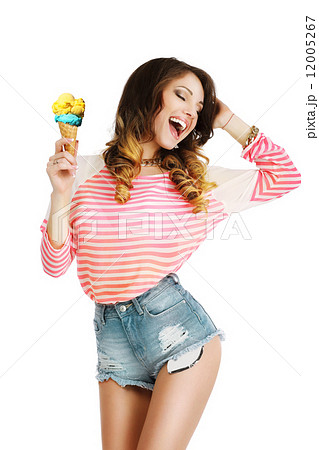 Pleasure. Cute Young Woman with Ice Cream Enjoying Life 12005267