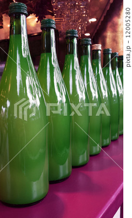 Harvest Festival. Row of New Wine in Green Bottles for Sale 12005280