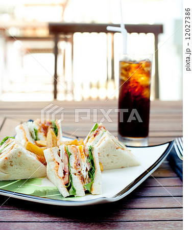 Club sandwich with iced soda drink Club sandwich with iced soda drink 12027386