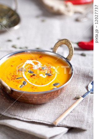 Pumpkin cream-soup with chili and seeds 12027737