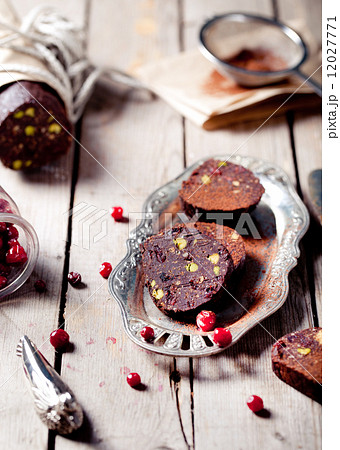 Chocolate dessert salami with cranberries Chocolate dessert salami with cranberries 12027771