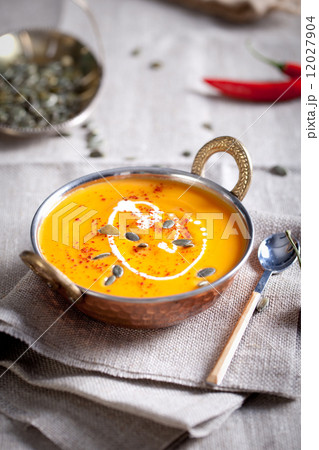Pumpkin cream-soup with chili and seeds Pumpkin cream-soup with chili and seeds 12027904