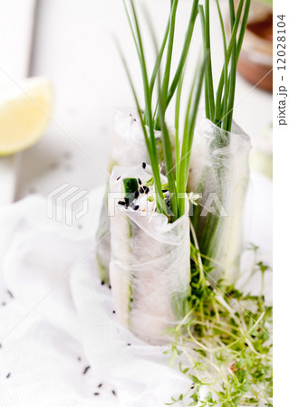 Fresh spring rolls on a white background Fresh spring rolls on a white background 12028104