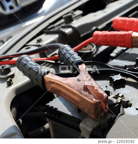 Charging battery car with electricity trough jumper cables 12029192