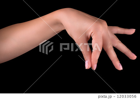 woman hand pick up object woman hand pick up object 12033056