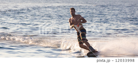 Wakeboarder in sunset. Wakeboarder in sunset. 12033998