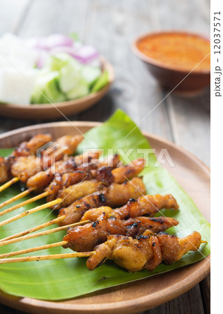 Asian delicious chicken sate 12037571