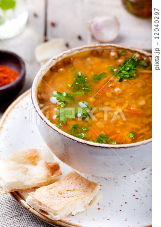 Lentil soup with smoked paprika and bread 12040297