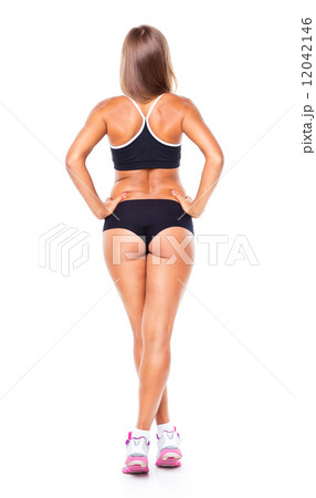 Young athletic girl on white view from the back 12042146