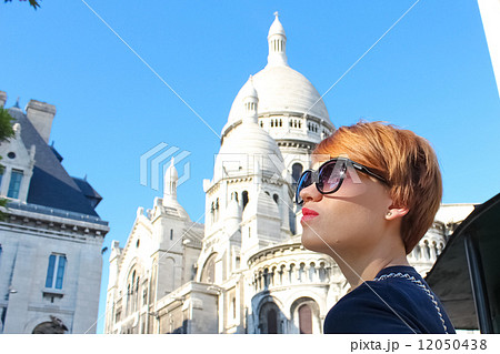 Beautiful young woman of Sacre-Coeur Basilica in the Montmartre 12050438