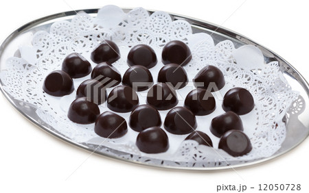 Tray of delicious chocolate sweets, close-up 12050728