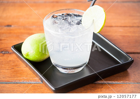 Glass of fresh homemade iced lemonade soda Glass of fresh homemade iced lemonade soda 12057177