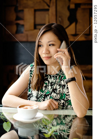 Asian Woman at Cafe 12057295