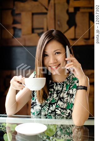 Asian Woman at Cafe Asian Woman at Cafe 12057302