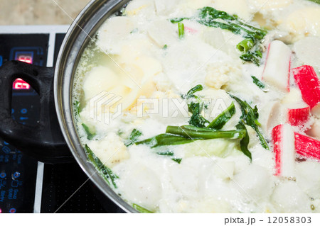 Boiling suki soup in big bowl Boiling suki soup in big bowl 12058303