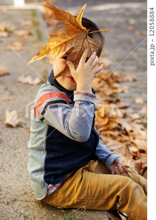 Little toddler boy in autumn park Little toddler boy in autumn park 12058884