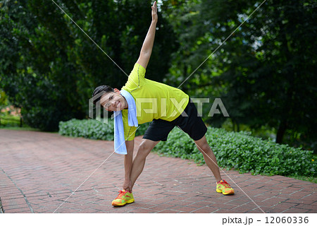 Asian man doing exercise Asian man doing exercise 12060336